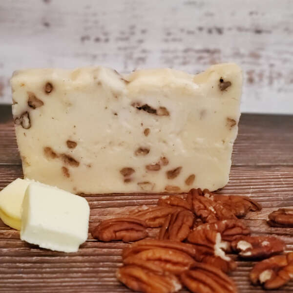 Butter Pecan Fudge with pecan pieces and a few slices of butter