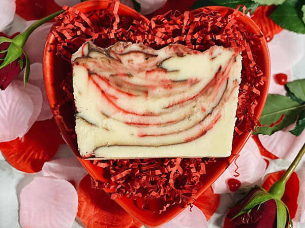 Photo of chocolate covered strawberry fudge in a heart shaped dish