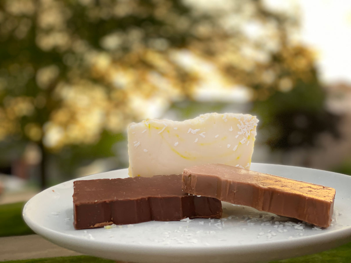 3 pieces of fudge with a tree backaground