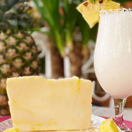 Photo of Pina Colada Fudge with a Pina Colada drink and a Pineapple